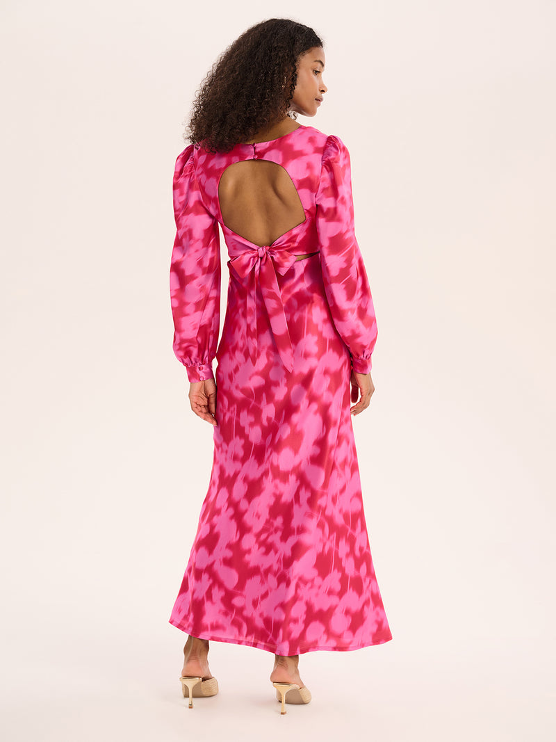 Pink floral print long sleeved maxi dress with open back with tie detail