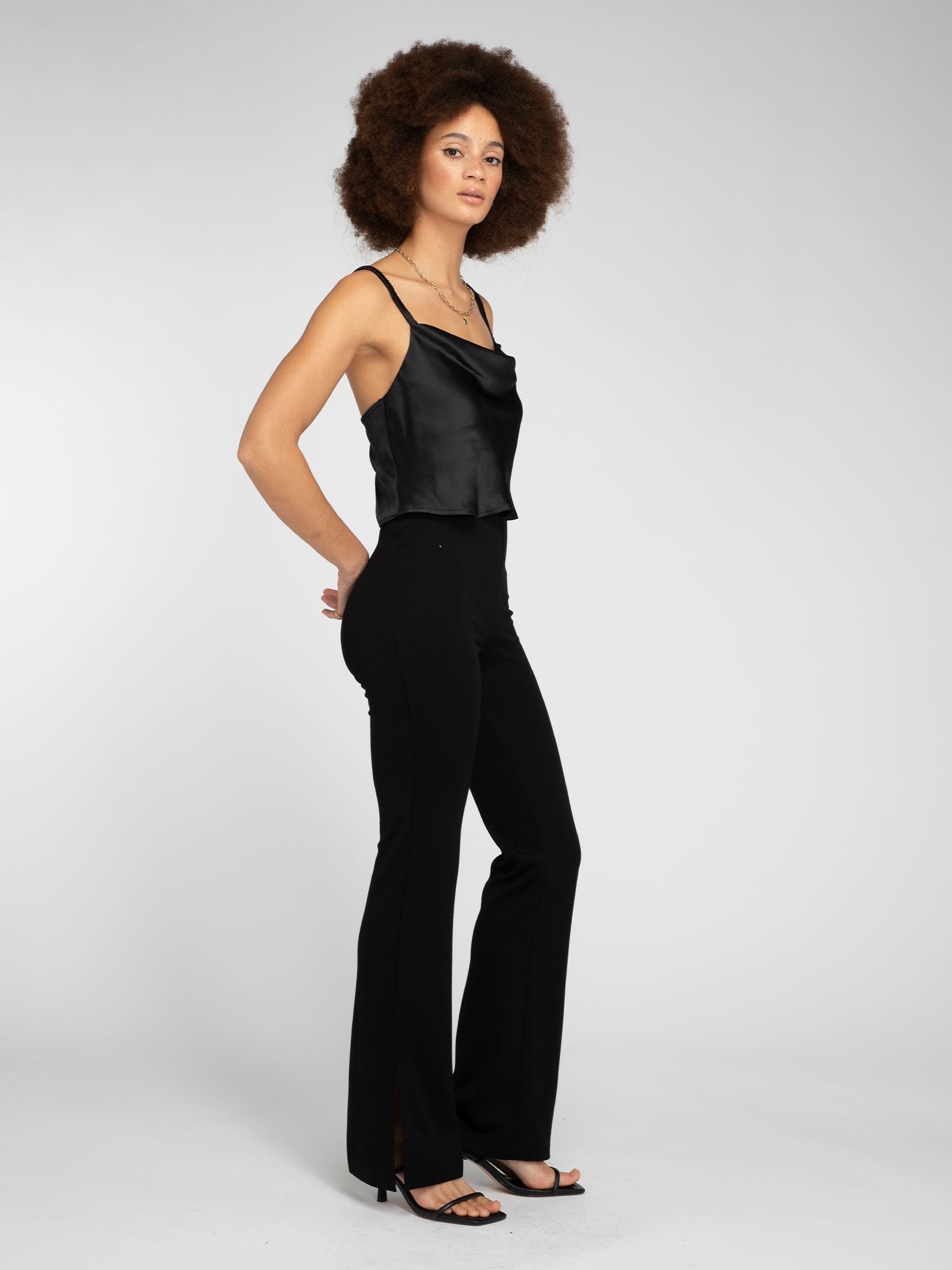 Thallo Flare Trousers in Black | OMNES | Trousers | Party Wear